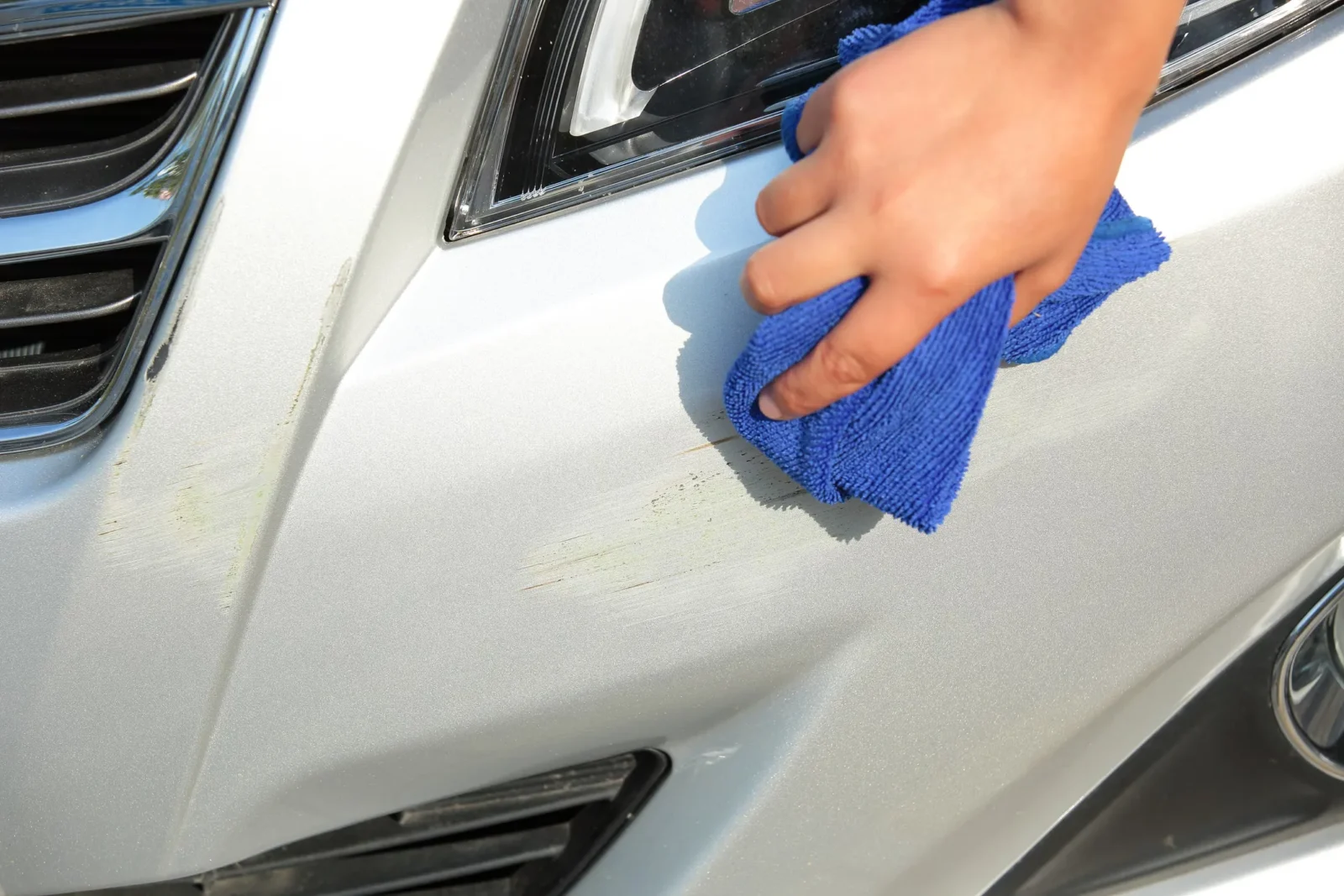 How to get rid of white scratches on car