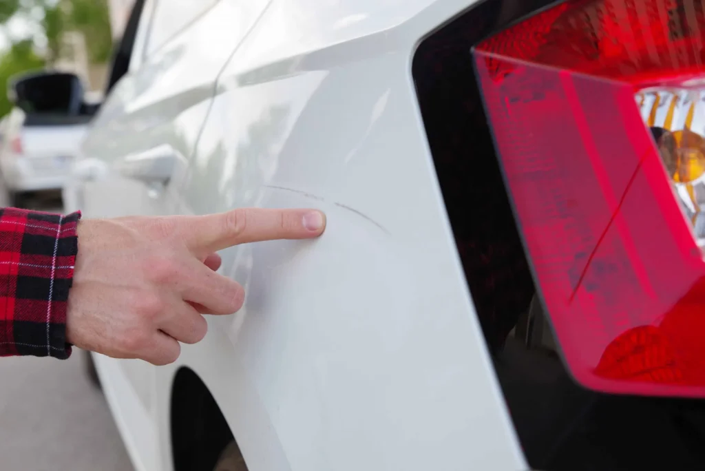 How to get rid of white scratches on car